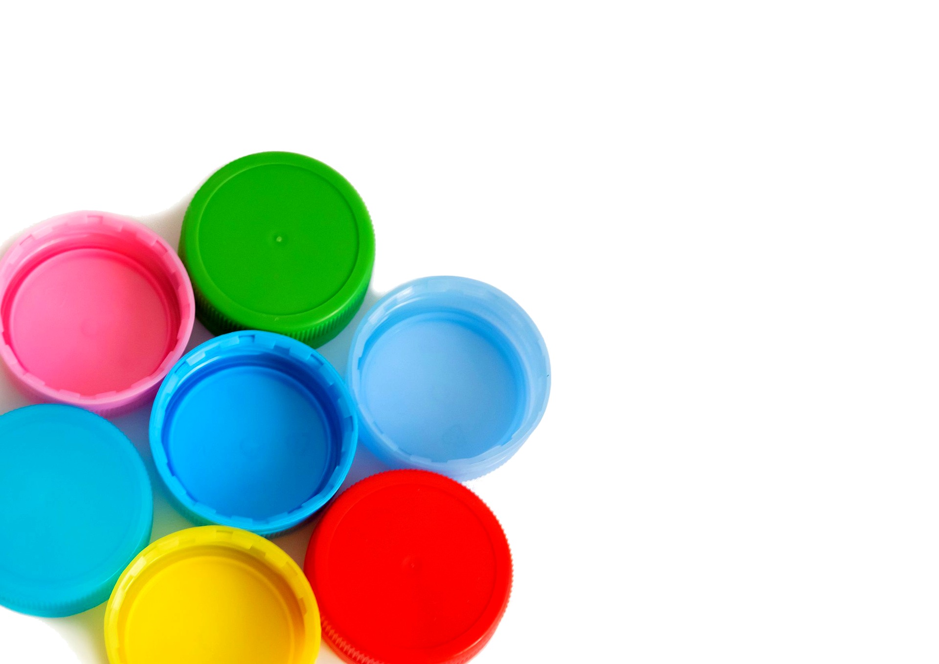 CPP plastic caps in various colors — green, pink, blue, red, yellow, turquoise